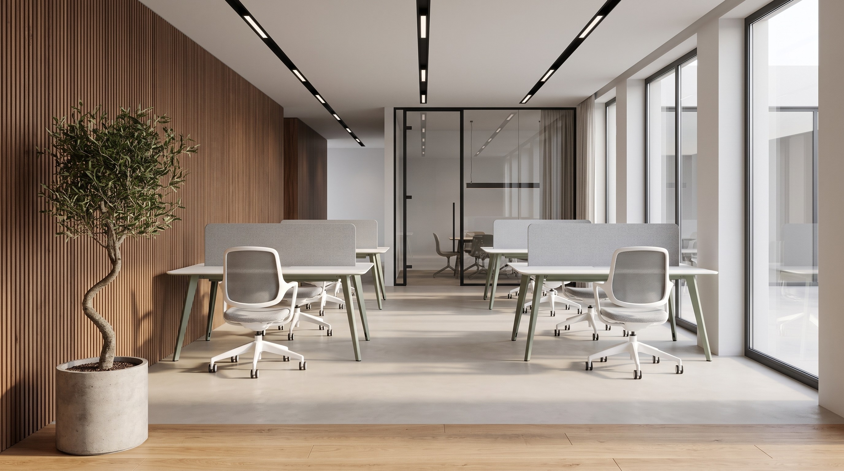 Open office floor furnished by Kavela: bench workstations, acoustic screens and task chairs