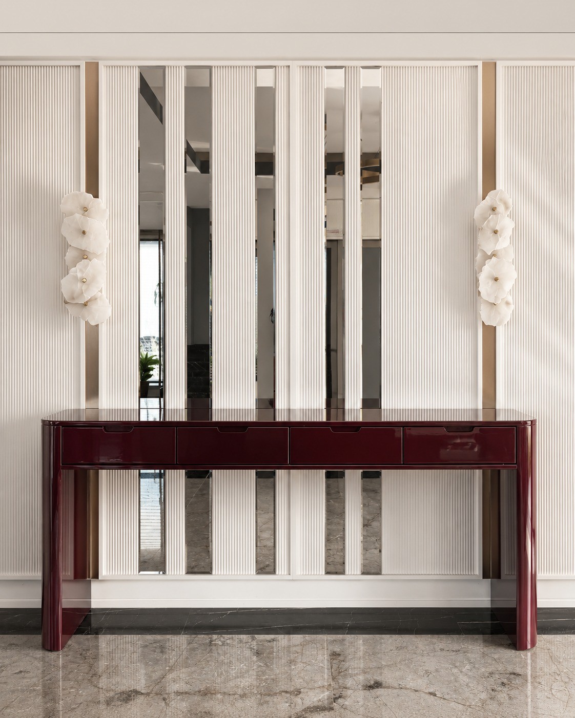 High-gloss lacquered console made by Kavela, against fluted panelling with brass and antique mirror